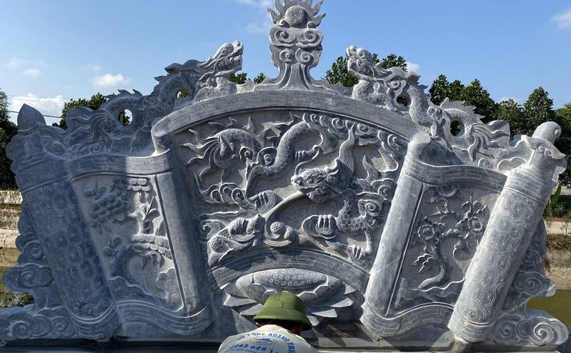 Cuốn thư đá mang hoa văn lưỡng long thư hùng